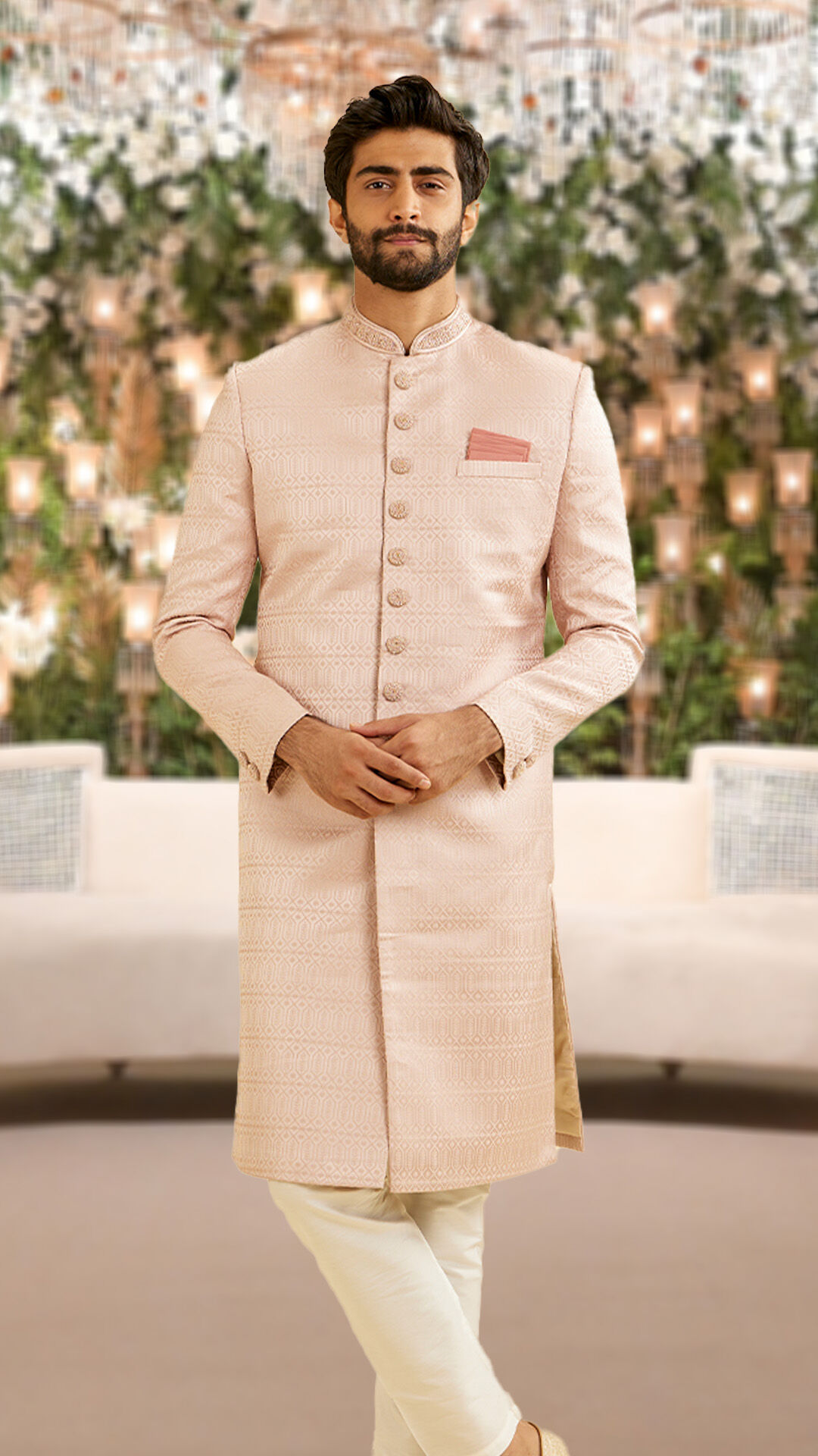 A groom in pink sherwani for wedding